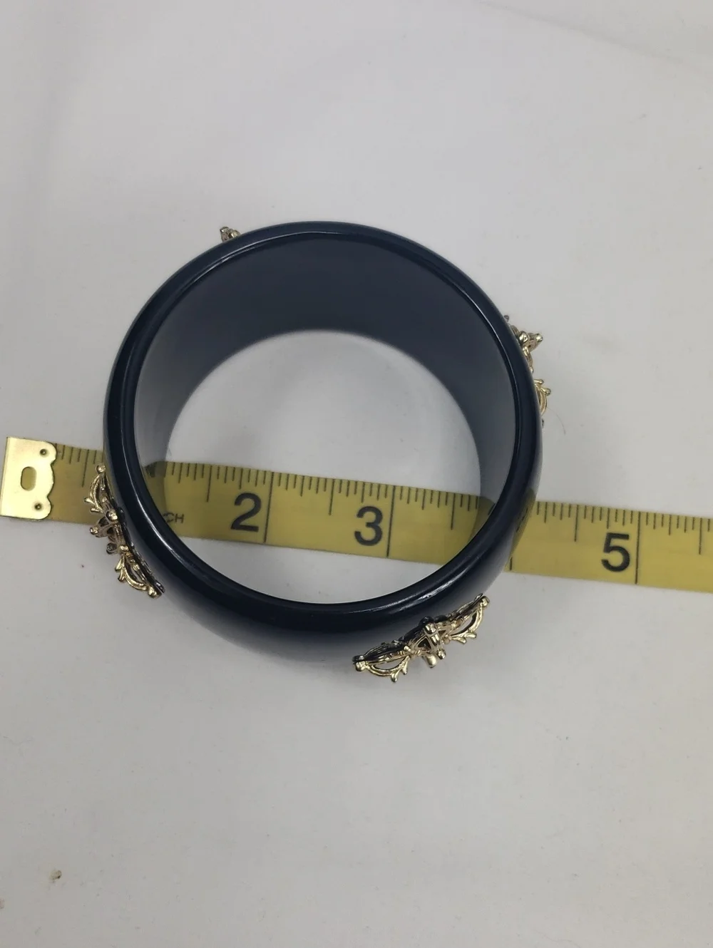 Black Resin or Lucite Bangle Bracelet with Gold Medallion Accents